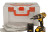 Charging Cabinets and Battery Storage showing a grey and orange storage box with drill and battery packs in front