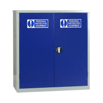 A wide double‑door PPE storage cabinet with blue doors, a grey frame, and “Personal Protective Equipment” labels on each door. A circular handle is placed at the center.