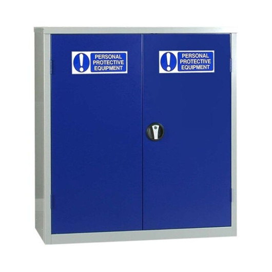 A wide double‑door PPE storage cabinet with blue doors, a grey frame, and “Personal Protective Equipment” labels on each door. A circular handle is placed at the center.