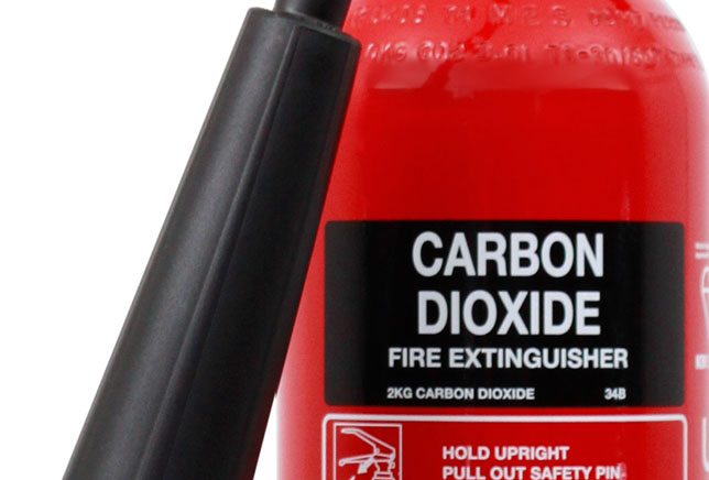 CO2 extinguisher in use