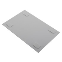 self adhesive wall mounting kit showing the back of a white ID sign with four adhesive pads attached