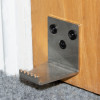 decamed stainless steel foot operated door opener attached to the base of a wooden door showing the metal pedal section