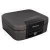 Angled view of sentrysafe fireproof waterproof a4 box paper digital media in dark grey with a lock on the front panel