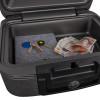 Sentrysafe fireproof waterproof A4 box open showing keys, coins, and British pound notes inside