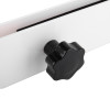 Close up of the back of a letterblox letterbox blanking plate showing a black knob attached to a white plate