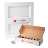 letterblox letterbox blanking plates shown installed on a white frame with an open box containing spare parts and a colour chart
