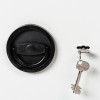 Keys attached to the de raat protector mp3 deposit safe key lock on a white surface