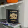de raat drs prisma security safe electronic lock showing a close up of a British passport inside the safe