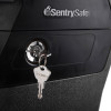 Close-up of the keys in the lock of a sentrysafe fhw40100 fireproof box