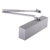 angled view of dorma ts72v overhead door closer in silver showing its main body and arm mechanism