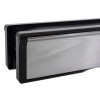 Close up of the end of a chrome 10 inch intumescent letter plate showing its smooth metal surface and frame edges