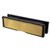 polished brass 10 inch intumescent letter plate shown at an angled view with black edges and smooth finish