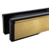 Close up of the end of a polished brass 10 inch intumescent letter plate showing smooth brass and black edges
