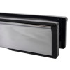 Close up view of the end of a chrome 12 inch intumescent letter plate showing its smooth metal and black frame edges