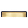 Polished brass 12 inch intumescent letter plate shown from the front with black trim and smooth brass surface