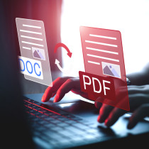 Hands typing on a laptop keyboard with digital icons showing document conversion in the Download product image