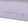Close up of the Henry Wolfe fire extinguisher cabinet showing brushed metal surface and engraved branding
