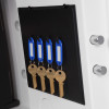 phoenix datacare ds2000 series key lock showing four keys with blue tags hanging on key hooks and locking bolts visible