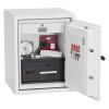 phoenix combi 2501 electronic lock showing the door open with items inside including a key rack and small safe