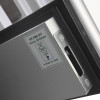 Close-up of a metal internal door edge with certification label and lock mechanism visible
