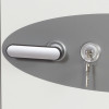 Close-up of a door front showing a silver handle and a lock with a key inserted