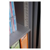 Adjustable shelf inside phoenix data commander 4622 fire safe with books and cases on it