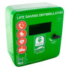 Angled view of a green polycarbonate outdoor defibrillator cabinet with heating and instruction labels on the front panel