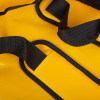 Close-up of the black strap on a yellow evac chair patient seat carrier
