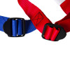 Close up of paraid child carrier harness buckle showing black plastic buckles attached to red and blue straps