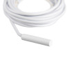 Closeup of sigma smart shield external cable reed contacts flush mounted showing white cylindrical sensor end with coiled cable