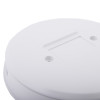 Closeup front view of the top surface of the aico product showing a smooth round white casing with holes