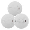 Three Ei-branded round alarms with central circular housings, including a heat alarm with a distinctive vented centre.