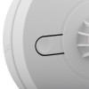 close-up of the button on the aico mains powered heat alarm alkaline battery backup