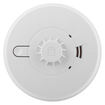 Front view of aico mains powered heat alarm alkaline battery backup showing circular white device with central sensor and indicator slots