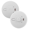 Two round white Aico Ei140e series alarms with simple front panels, one with a smooth finish and one with a vented heat‑sensor grid.