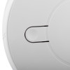 Close-up of the button on the aico mains powered optical smoke alarm alkaline battery backup