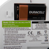 Closeup back view of aico mains powered optical smoke alarm alkaline battery backup showing battery compartment and label details