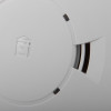 Close-up of the sounder part of the aico mains powered optical smoke alarm alkaline battery backup in white plastic