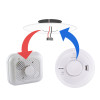 Front view of replacement mains powered heat alarm showing circular white device with vents and central button