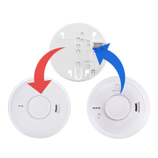 front view of the replacement mains powered heat alarm showing both the front cover and the back mounting plate with arrows