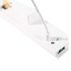 Closeup of the smartlink module showing a white rectangular device with a connected cable and a visible port end
