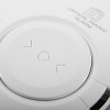 Close-up detail of the aico mains powered optical smoke alarm self charging 10yr battery backup button and label