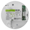 Back view of aico mains powered optical smoke alarm self charging 10 year battery showing labels and internal components