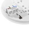 aico mains powered carbon monoxide alarm self charging 1 yr battery backup base shown from an angled view