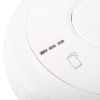 aico mains powered carbon monoxide alarm showing three indicator lights and a wireless signal icon