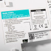 Label on aico mains powered carbon monoxide alarm showing model number, warnings, test instructions, and replacement date