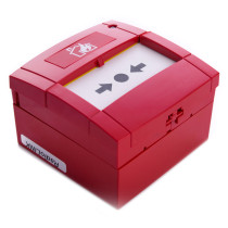 angled view of a red wireless manual call point showing a white panel with black arrows and a circle in the centre
