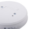 Close up view of the white rf relay base showing its smooth circular shape and mounting holes
