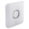 aico wireless smoke co alarm controller shown at an angled view with circular button and white square casing