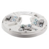 angled view of a hochiki esp detector base showing metal connectors and screw terminals on a white circular plate